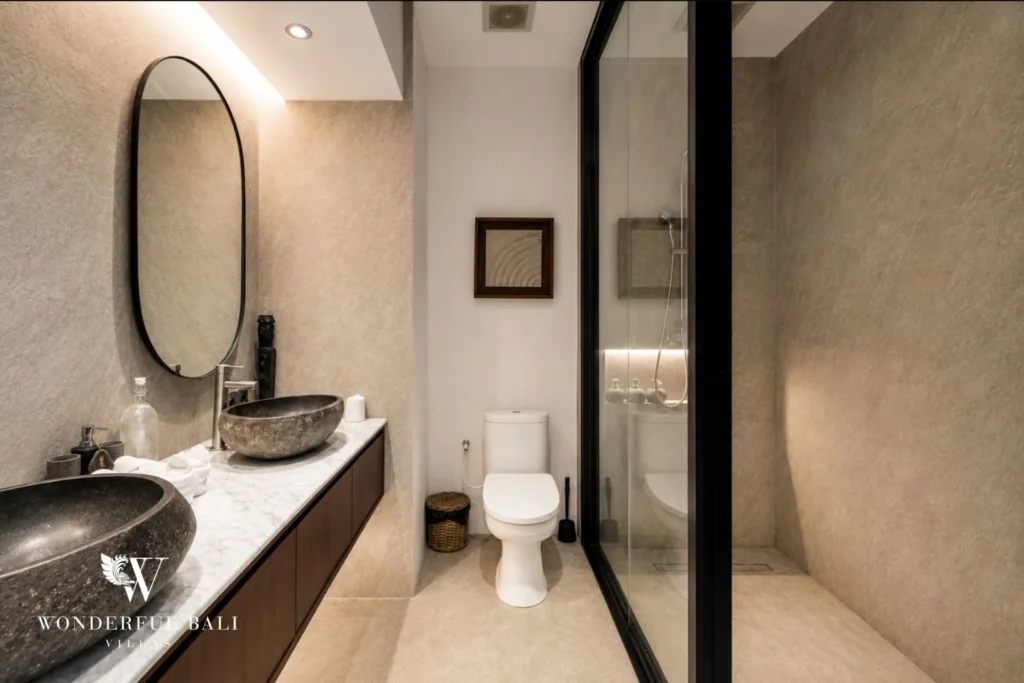 5BR villa for long-term rent Cemagi — bathroom with vanity and toilet