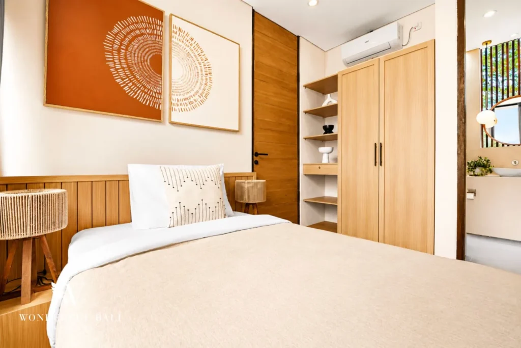 3BR villa for monthly rent Jimbaran — bedroom with rattan headboard
