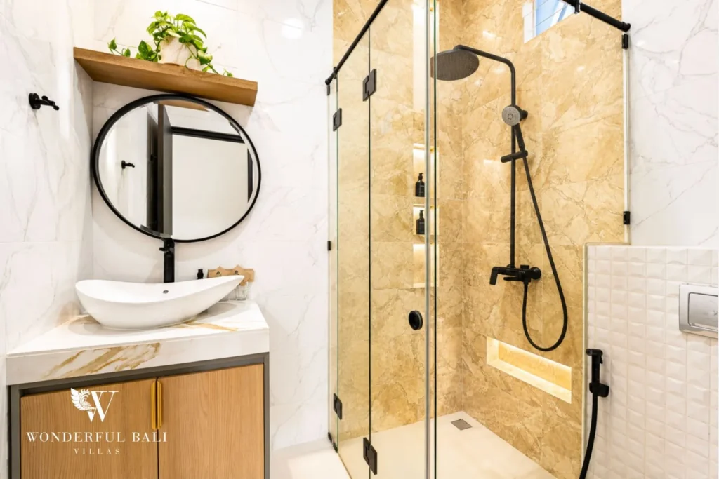 3BR villa for monthly rent Jimbaran — bathroom vanity with round mirror