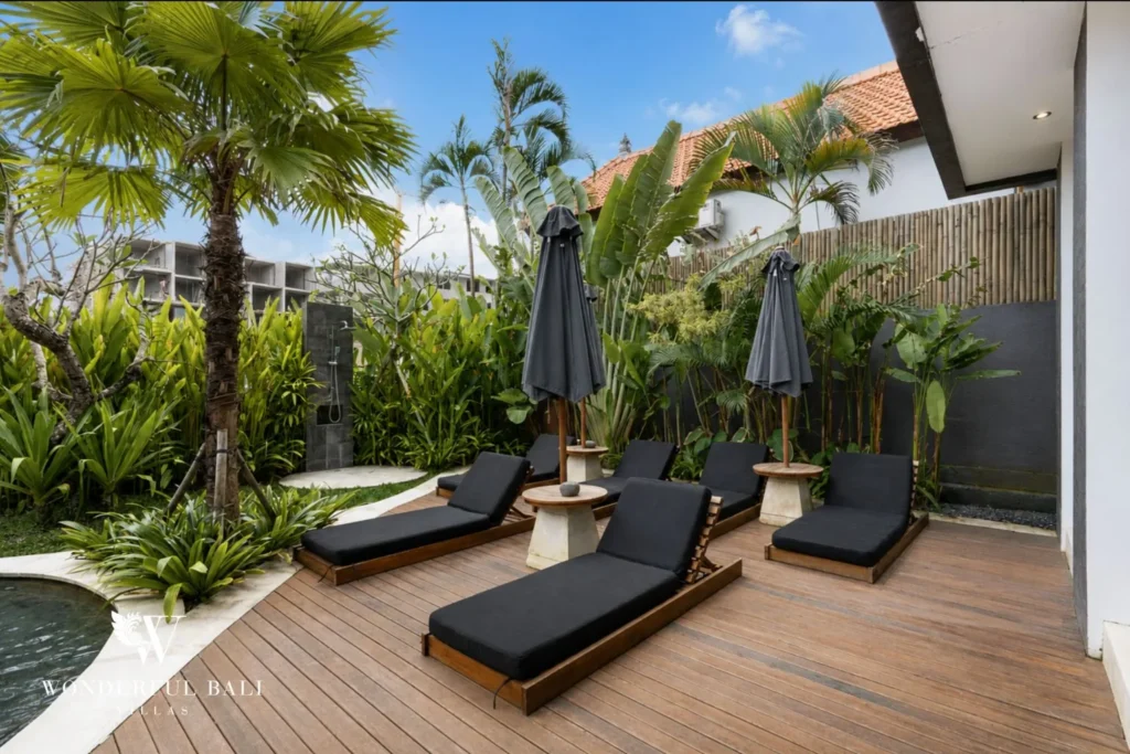 5BR villa for long-term rent Cemagi — tropical garden with sun loungers