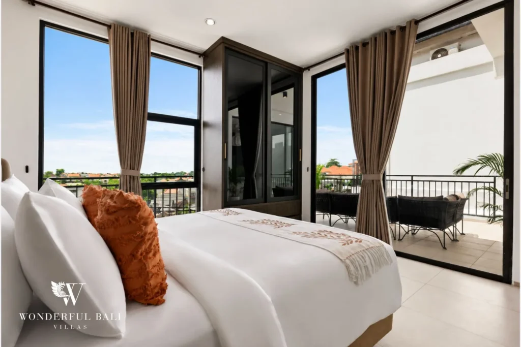 monthly villa rental pererenan — ensuite bedroom with garden view