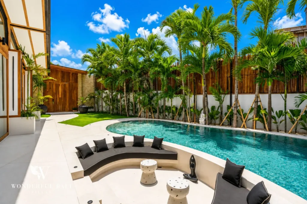 Poolside sunken lounge in daytime at family villa in Umalas, Bali