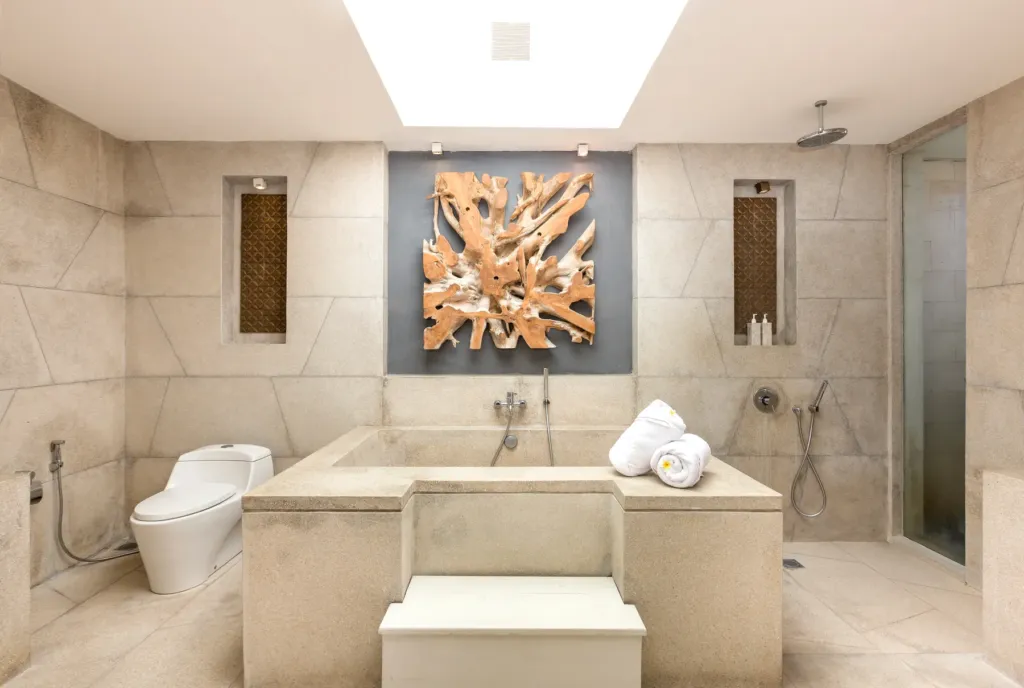 Bathroom with double vanity and twin basins at villa in Batu Belig, Bali
