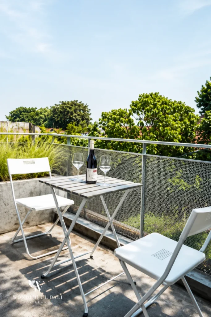 Rooftop terrace with bistro table and chairs at villa in Umalas, Bali