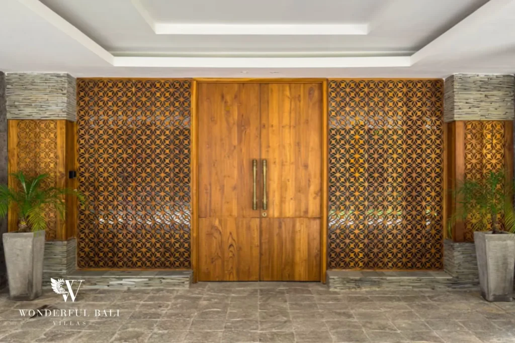Villa exterior with garden and feature wall at villa in Umalas, Bali