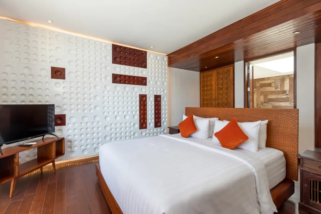 Second bedroom with king bed and garden outlook at villa in Batu Belig, Bali
