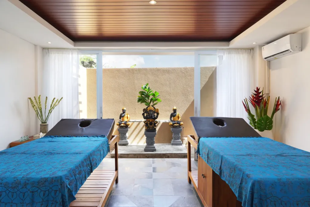 On-site spa treatment room with twin beds in Batu Belig, Bali