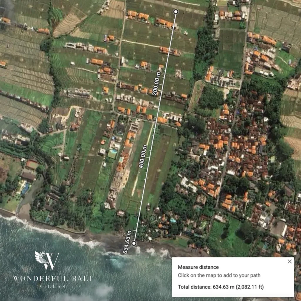 Aerial view of a land plot with location marker near the coast in Seseh Bali
