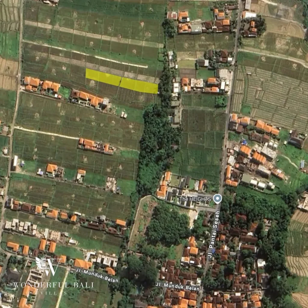 Aerial view of land plots among rice fields in Seseh Bali