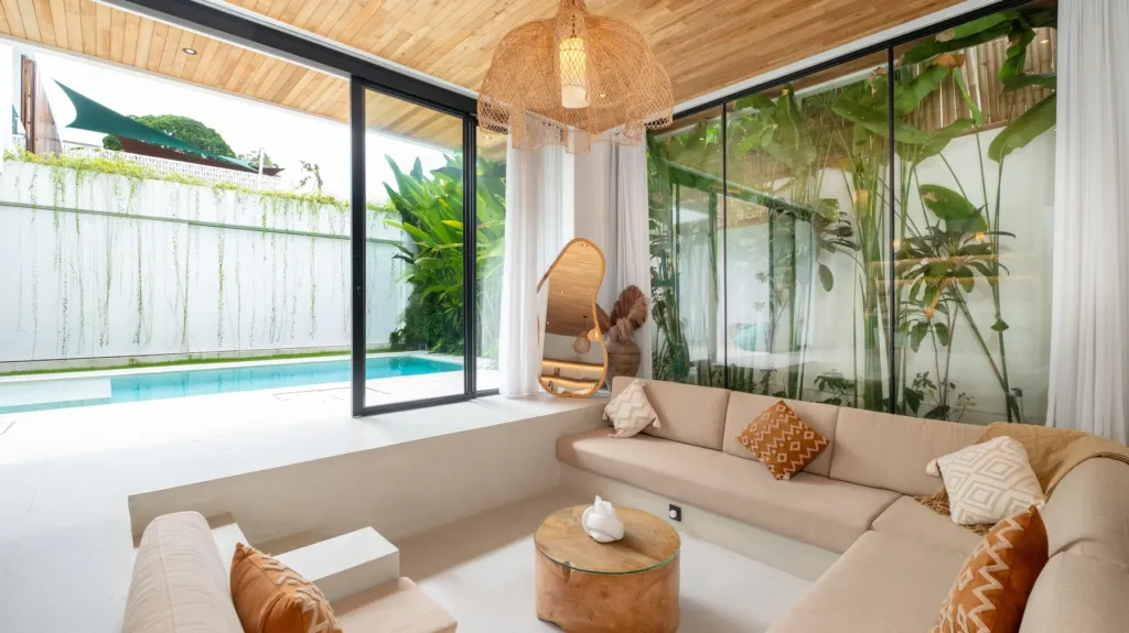 Loona Palm Villa 1 living room with pool view in Canggu, Bali