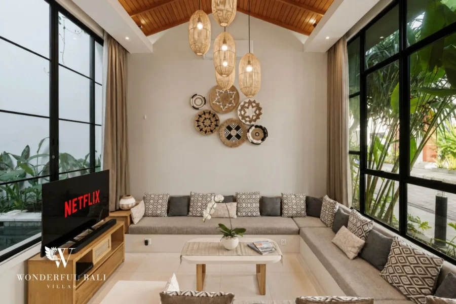 2BR modern villa in Canggu — bright open-plan living room with vaulted timber ceiling and Smart TV, Batu Bolong