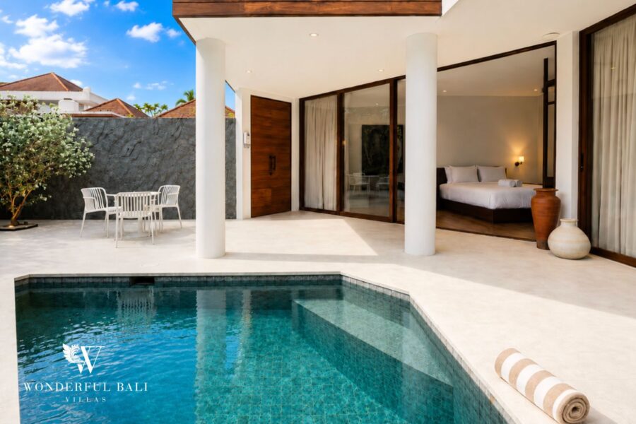 Private pool and terrace with a poolside bedroom beyond at a villa in Berawa, Canggu