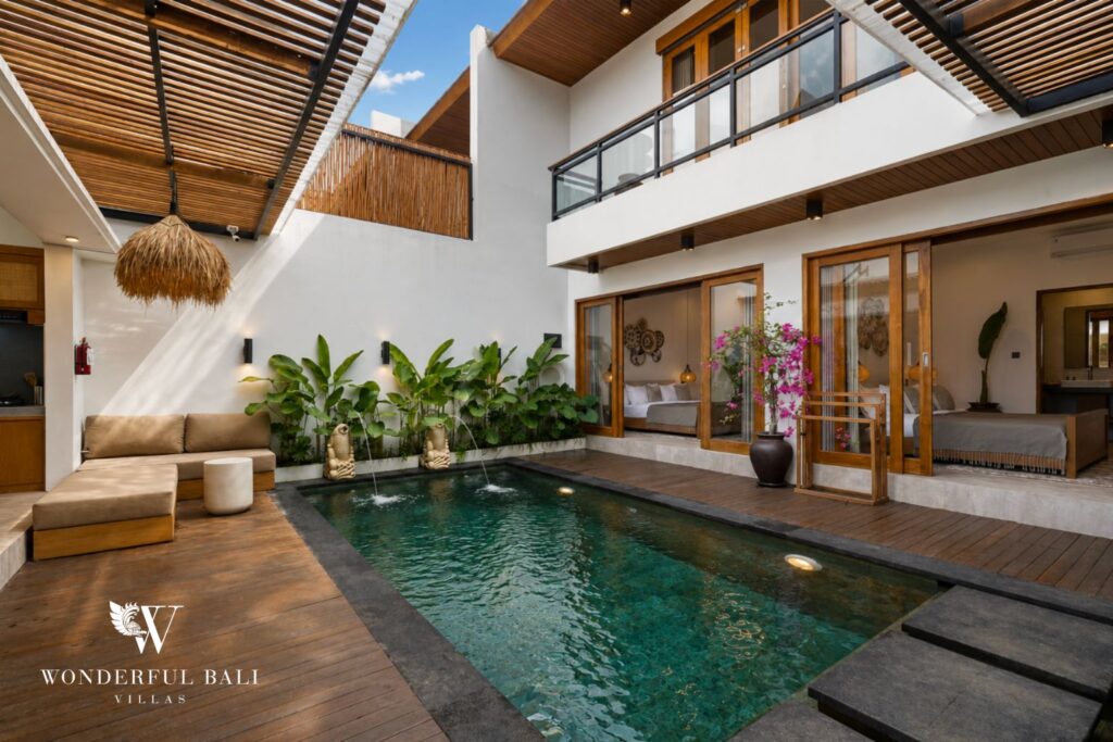 Private pool with an open living pavilion at a villa in Canggu