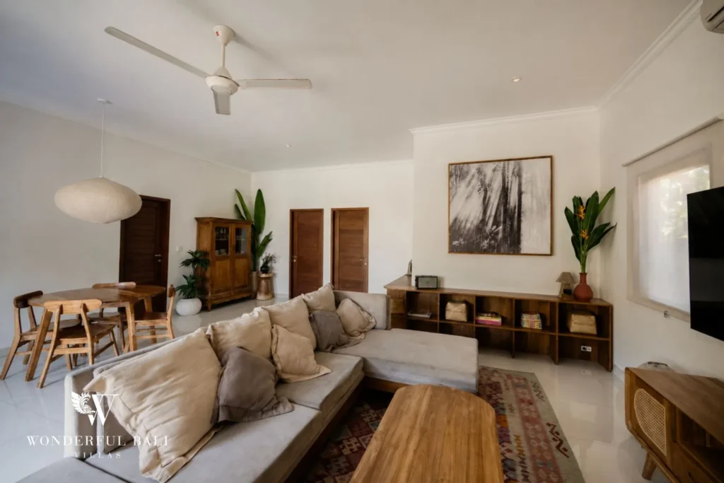 2BR tropical family villa in Berawa — enclosed living room with tv