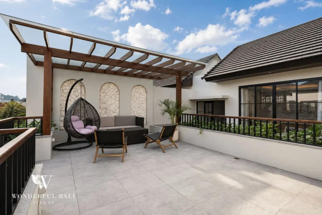 2BR modern villa in Canggu — rooftop terrace with hanging chair