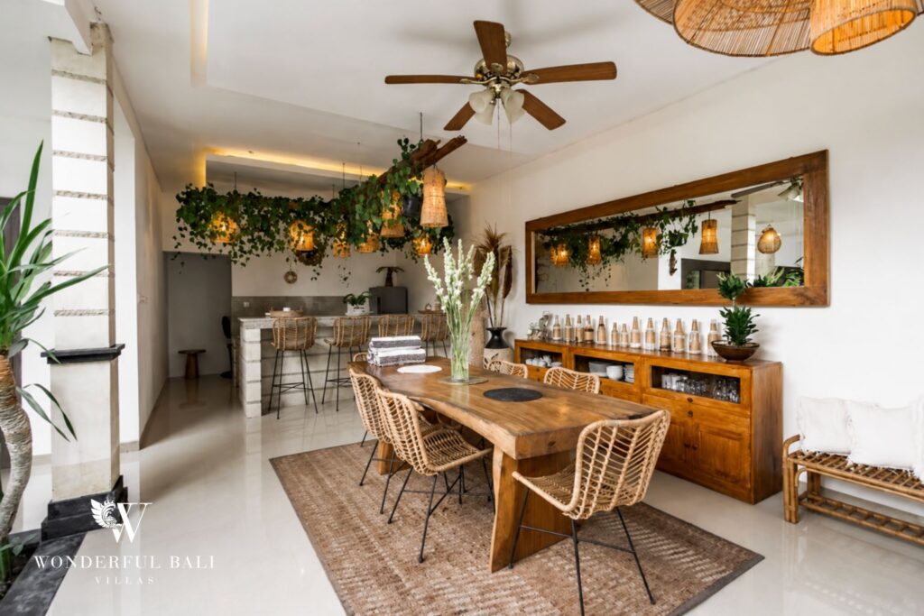Kitchen and dining area with breakfast bar at a villa in Batu Bolong, Canggu