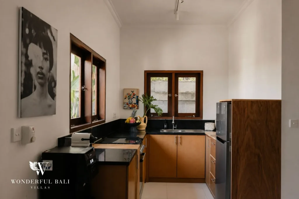2BR tropical family villa in Berawa — kitchen with black worktop