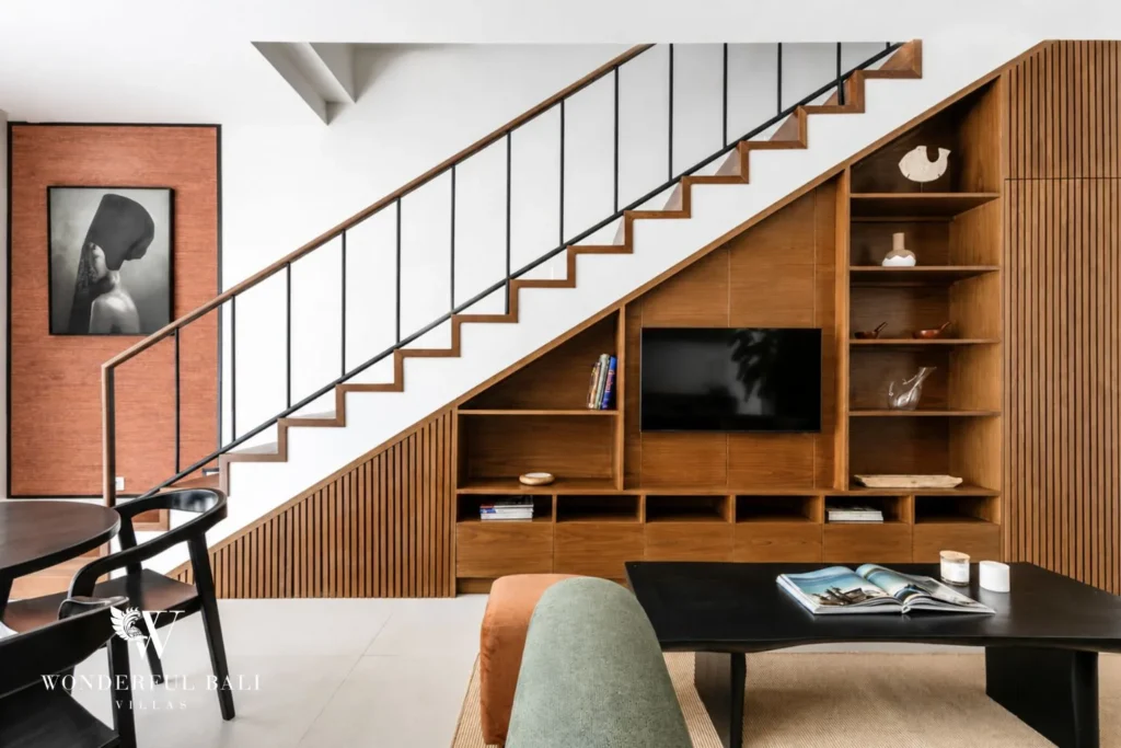 2BR modern villa in Umalas — living area with staircase and built in shelving