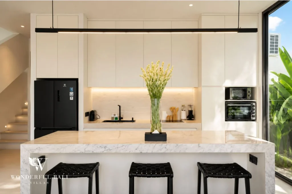 3BR ocean-view villa in Seseh — modern kitchen and dining with black island