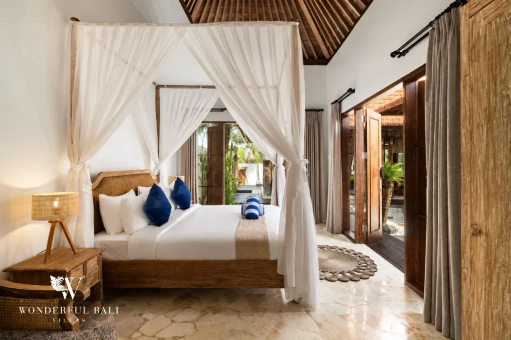 3BR tropical villa in Pererenan — bedroom with four poster canopy bed