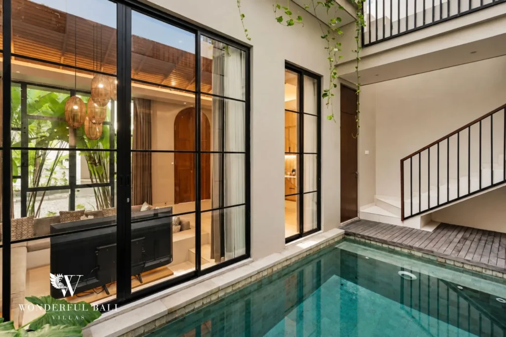 2BR modern villa in Canggu — living opening to pool