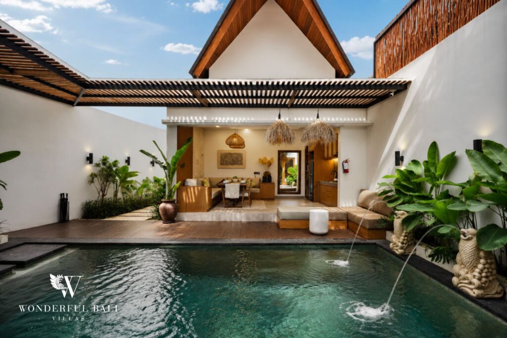 Pool courtyard with thatched alang-alang roof at a villa in Canggu