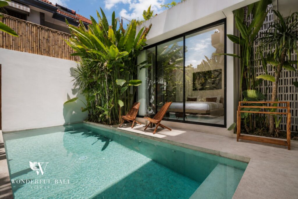 Private pool framed by a tropical garden at a villa in Petitenget, Seminyak