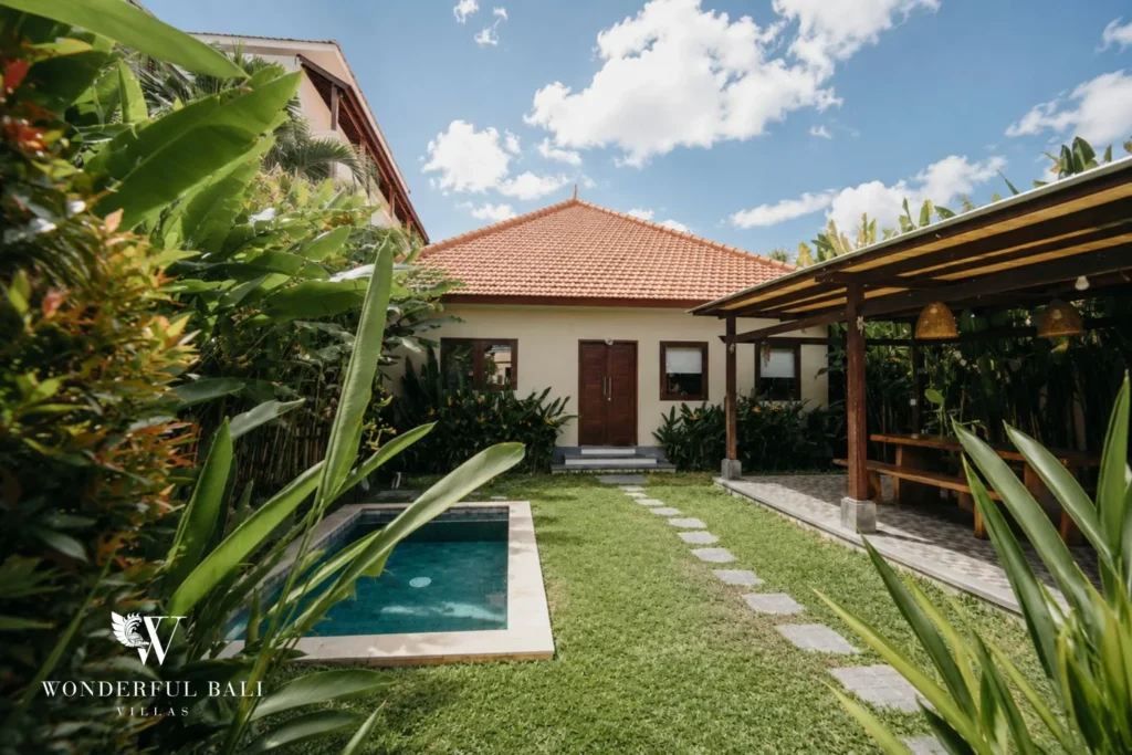2BR tropical family villa in Berawa — villa and pool from garden