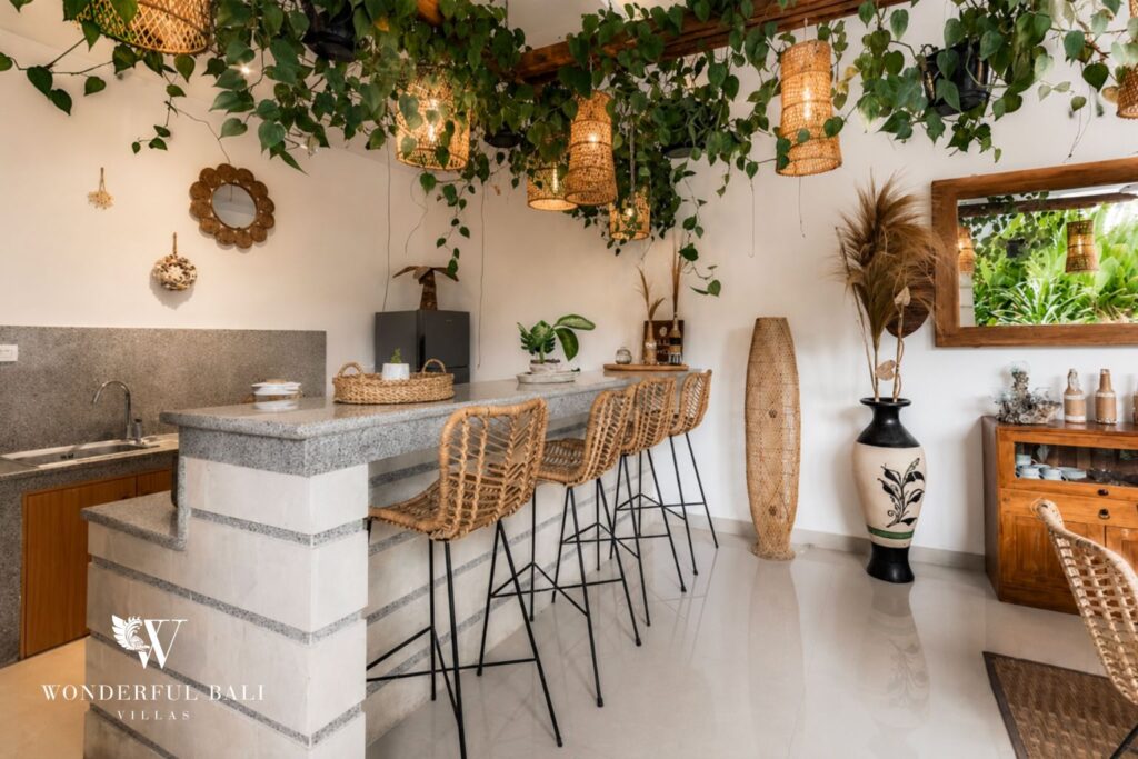 Fully equipped kitchen with breakfast bar stools at a villa in Batu Bolong, Canggu