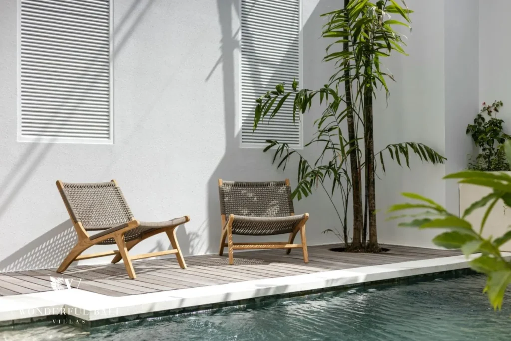 2BR modern villa in Umalas — poolside lounge chairs