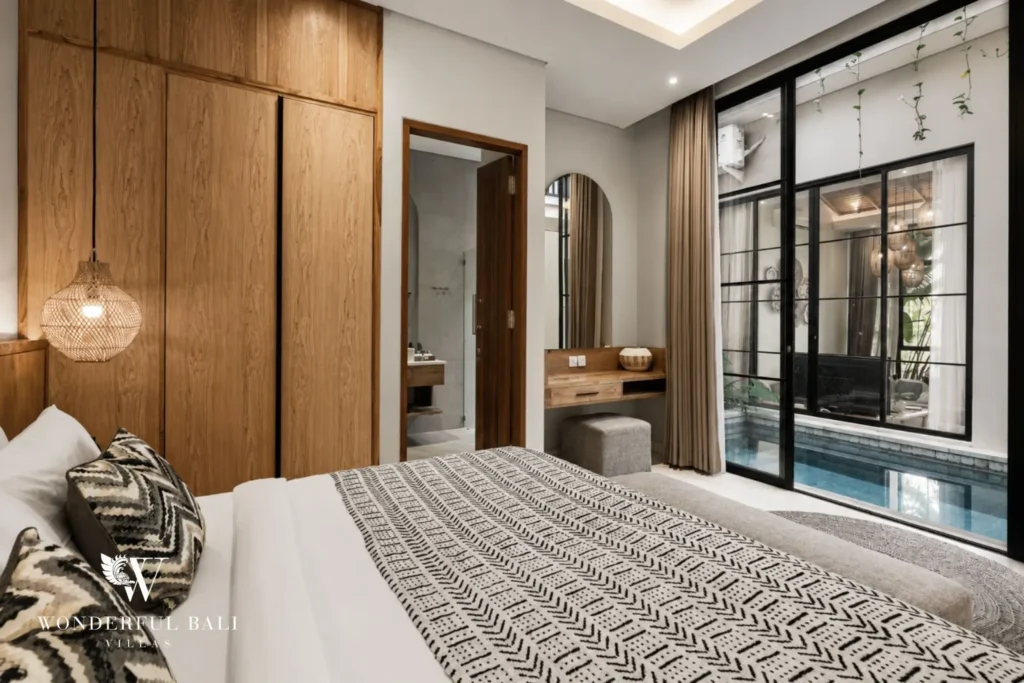 2BR modern villa in Canggu — bedroom opening to pool