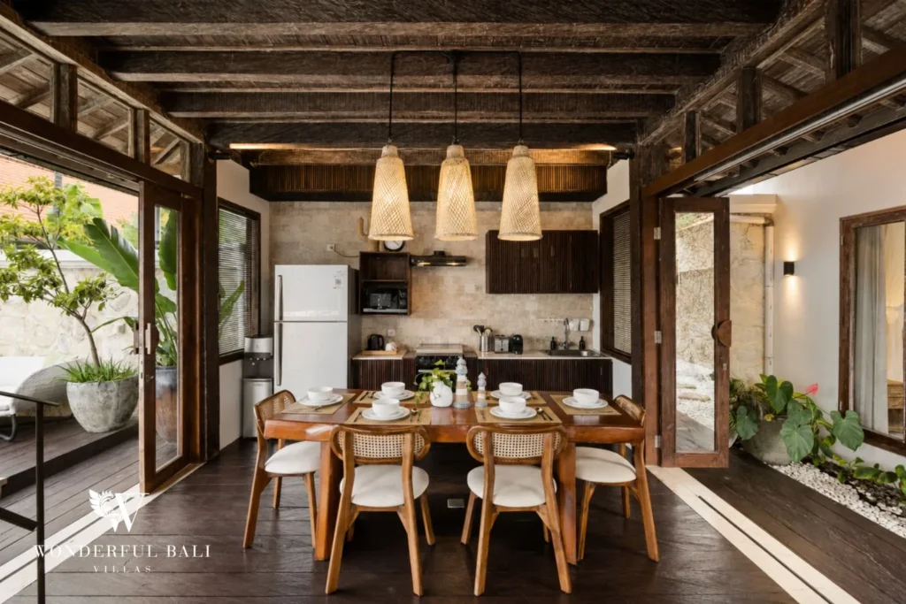 3BR tropical villa in Pererenan — dining table for six under thatched roof