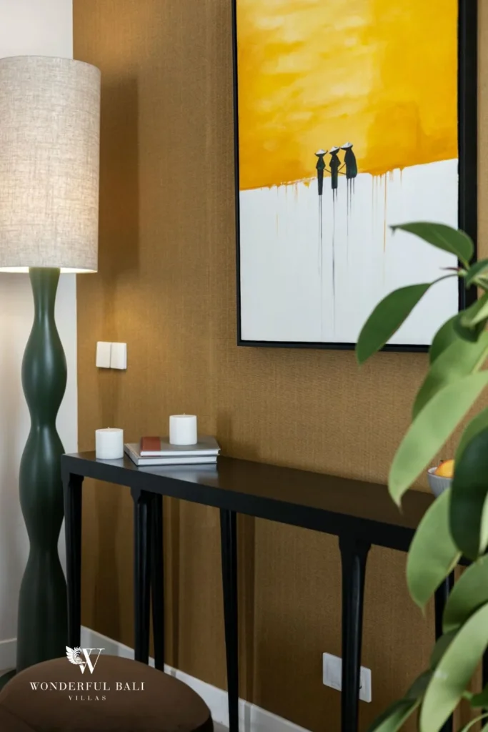 2BR modern villa in Umalas — entrance console with artwork