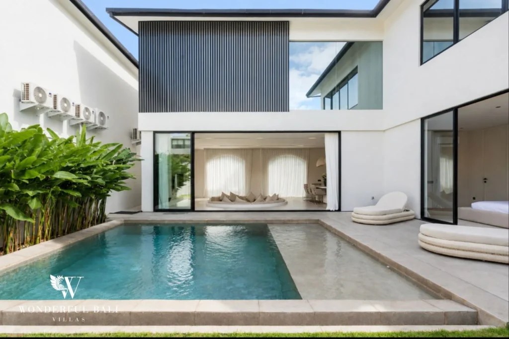 Private pool and two-storey facade of a modern 3-bedroom villa in Umalas, Bali