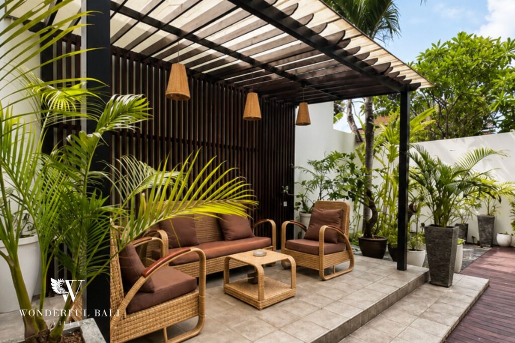 Outdoor lounge under a timber pergola at a villa in Seminyak