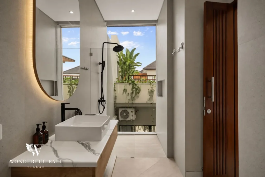 2BR modern villa in Canggu — en suite bathroom with semi outdoor shower