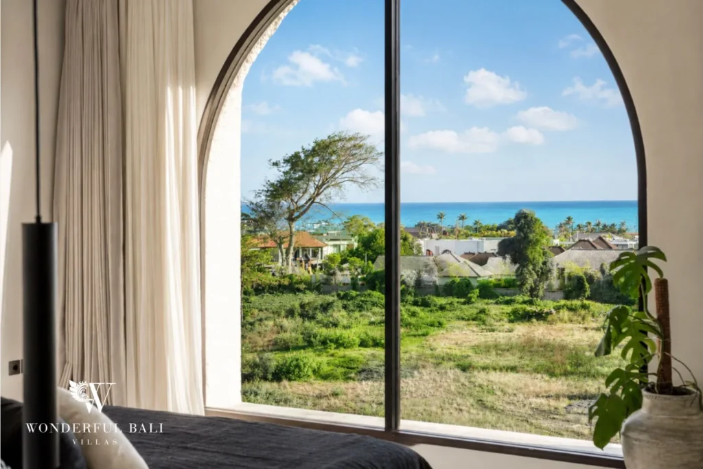 3BR ocean-view villa in Seseh — rooftop terrace with ocean and rice field views