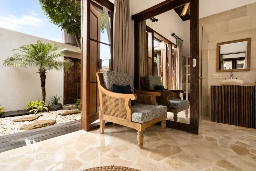 3BR tropical villa in Pererenan — bedroom seating corner with garden view
