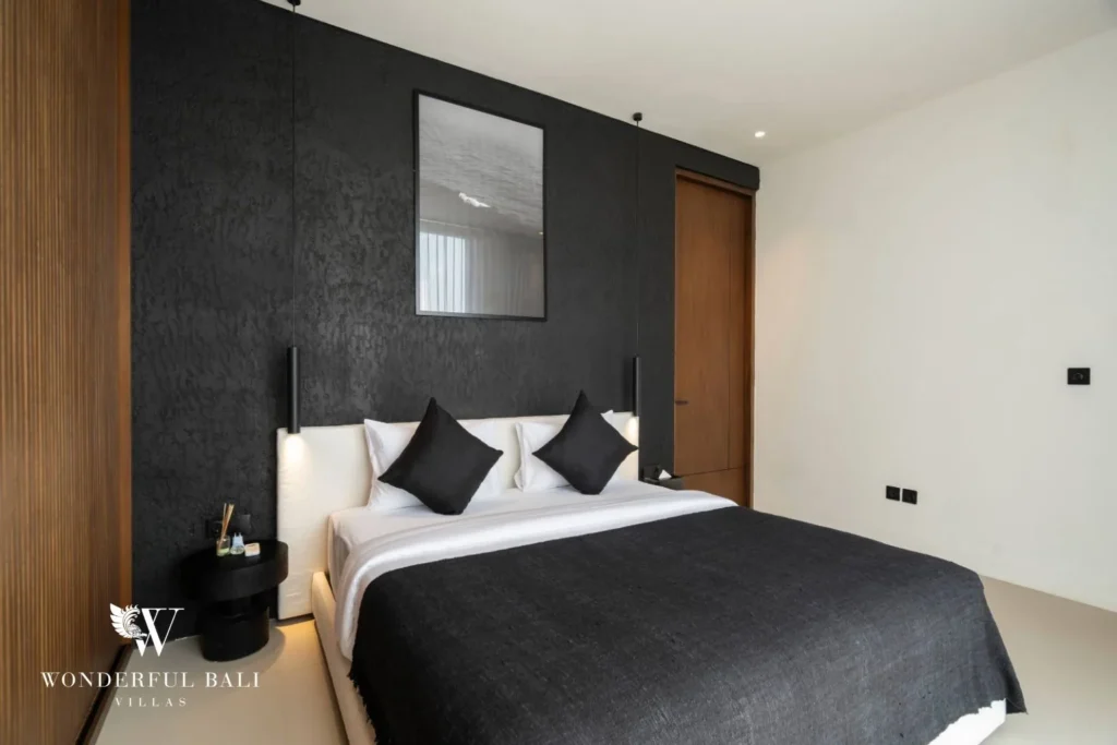 3BR ocean-view villa in Seseh — bedroom with black feature wall