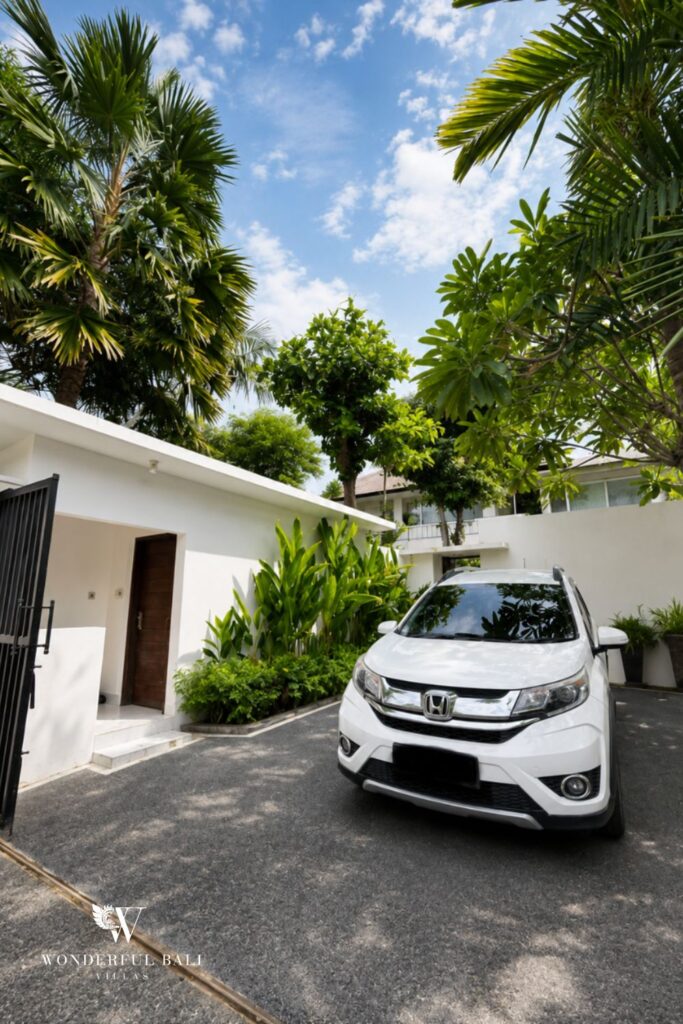 Private parking with car at a villa in Seminyak