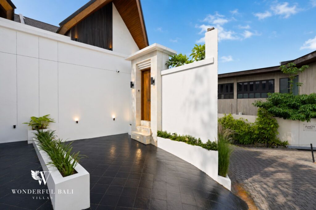 Villa entrance with dedicated parking space at a villa in Canggu