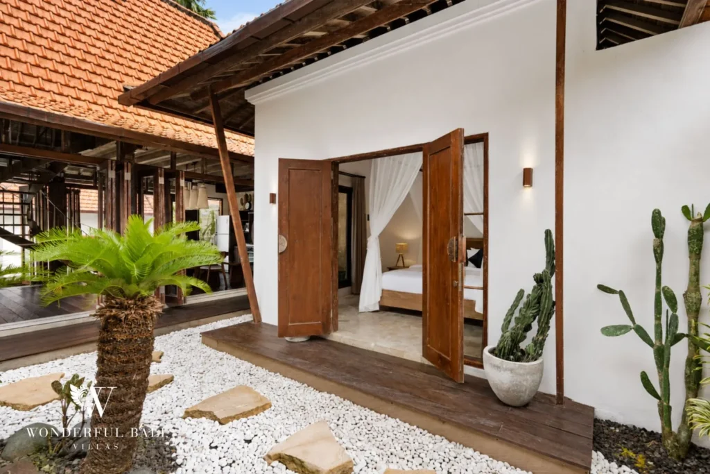 3BR tropical villa in Pererenan — bedroom opening to garden courtyard