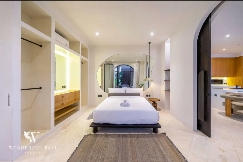 Bedroom with built-in wardrobe and lit dressing bay in a 4-bedroom villa in Canggu Bali