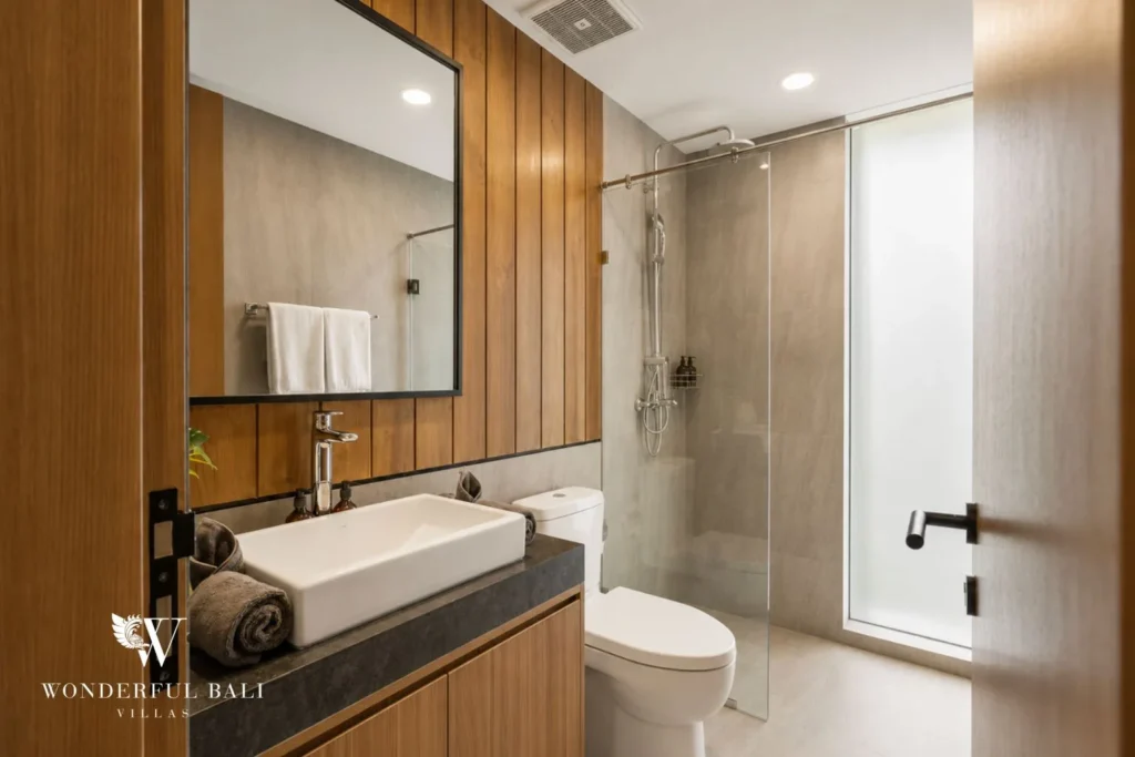 4BR resort villa in Jimbaran — en suite bathroom with black vanity