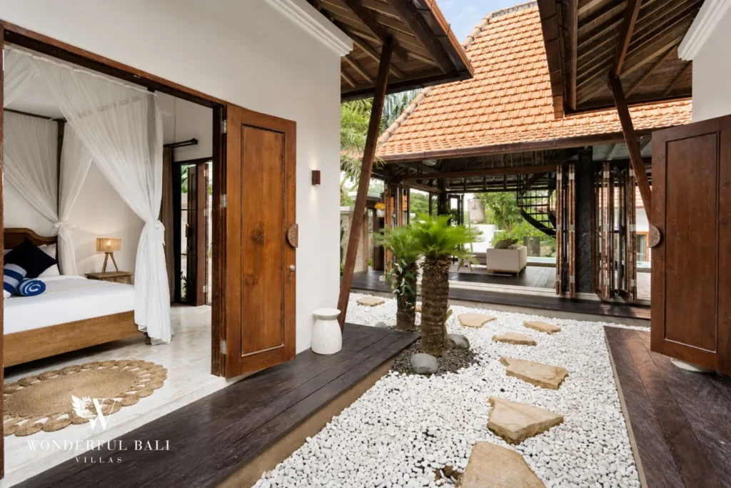 3BR tropical villa in Pererenan — semi outdoor bedroom entrance with stepping stones