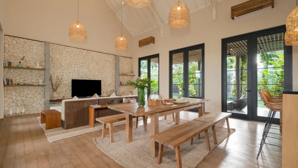 Open plan living and dining at M Villa 318, a 5-bedroom private-pool villa a short walk from Batu Bolong Beach in Canggu, Bali