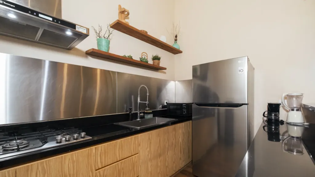 Kitchen at M Villa 318, a 5-bedroom private-pool villa a short walk from Batu Bolong Beach in Canggu, Bali