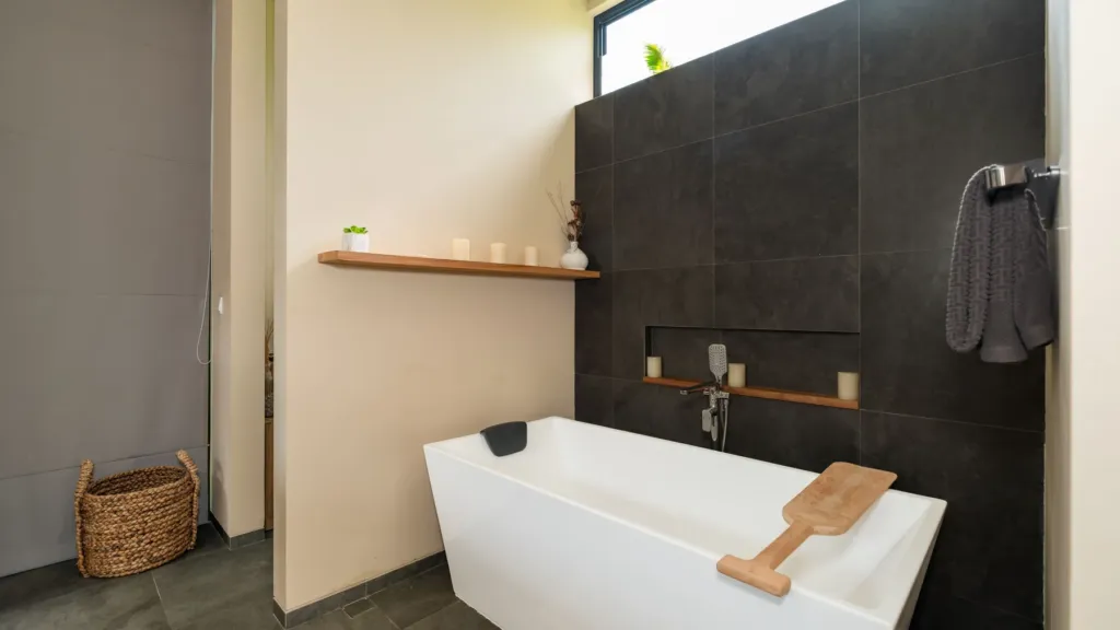 Bedroom one ensuite bathtub at M Villa 318, a 5-bedroom private-pool villa a short walk from Batu Bolong Beach in Canggu, Bali
