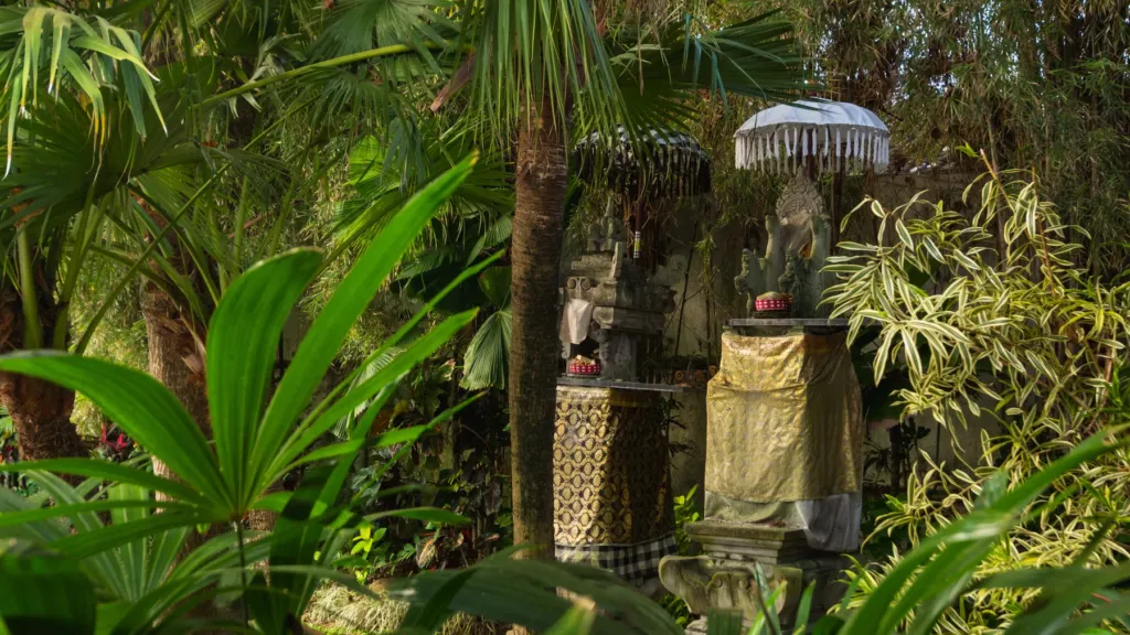 Garden shrine at M Villa 318, a 5-bedroom private-pool villa a short walk from Batu Bolong Beach in Canggu, Bali