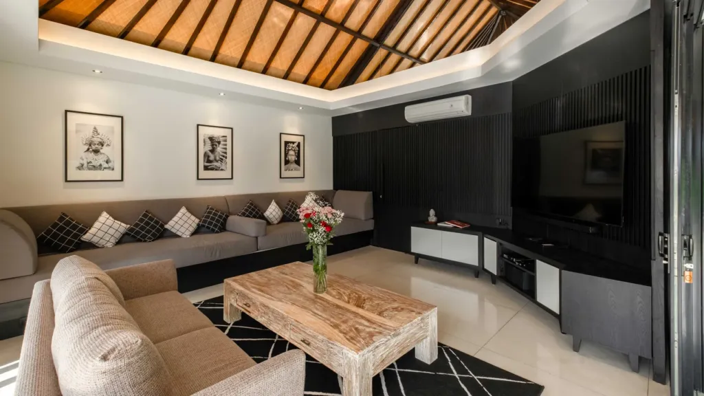 Air conditioned living room at Villa Kubu Dewi Sri, a 5-bedroom private-pool villa in Berawa, Canggu, Bali